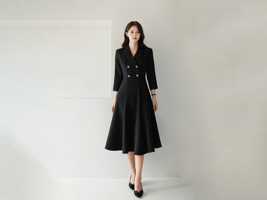 Classic black flare dress with collar and double-breasted buttons, 3/4 sleeves, elegant style, ideal for formal settings.