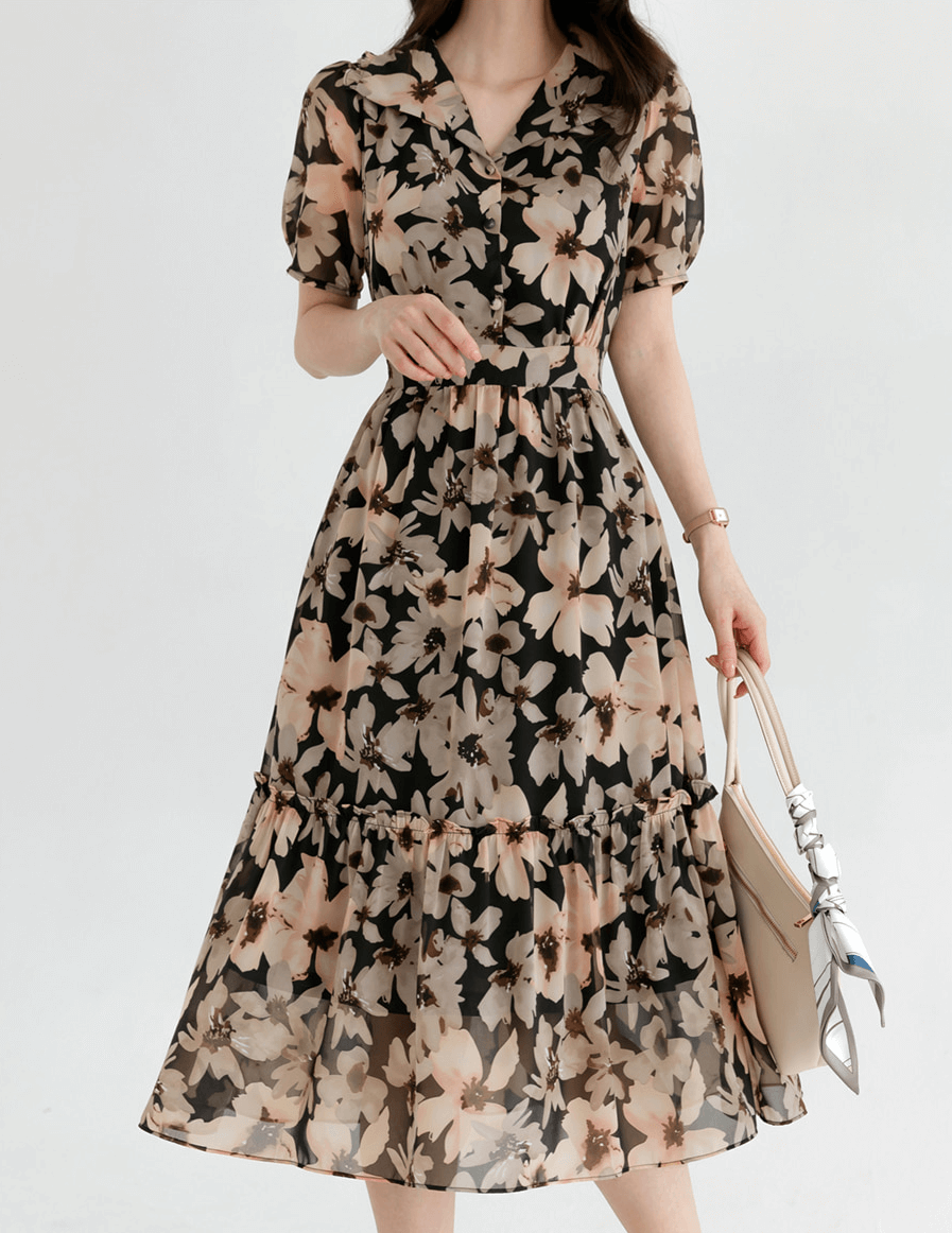 Floral chiffon dress with wide collar and puff sleeves, perfect for a feminine look. Features a frill trim and cinched waist.