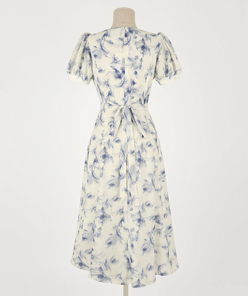 Elegant chiffon dress with blue-violet abstract print and ruffle square neckline, back view