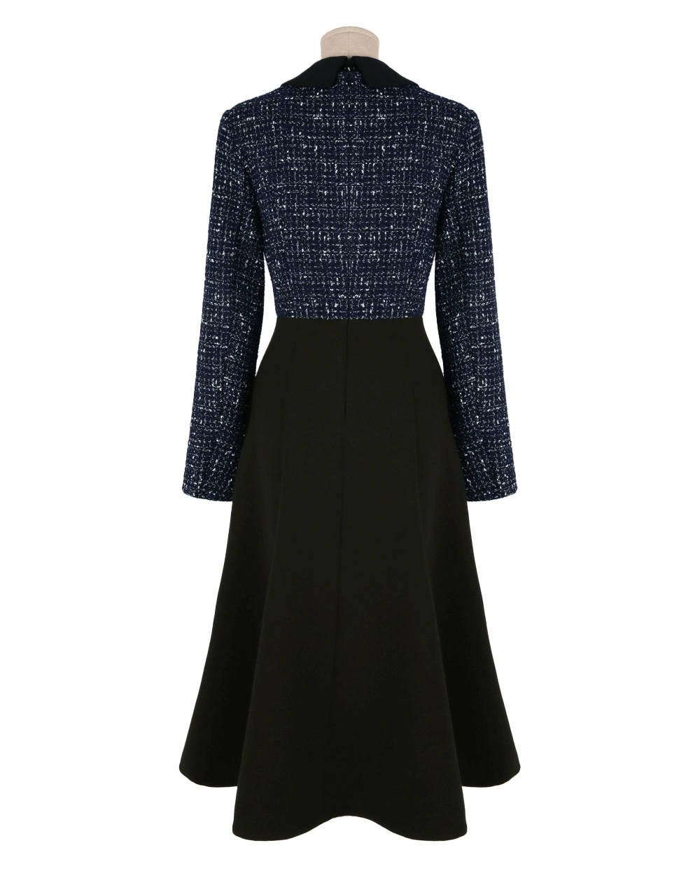 Back view of two-tone tweed and black flare dress with gold button detail, featuring navy tweed top and smooth black skirt.
