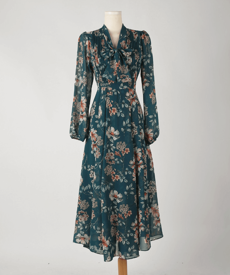 Floral chiffon flare dress with V-neck and convertible neck tie displayed on mannequin.