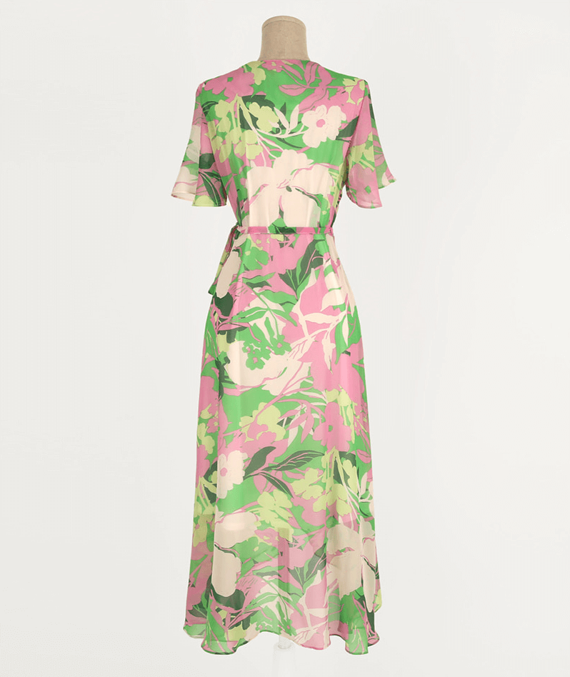 Back view of a floral chiffon wrap dress with tulip hem, featuring pink and green tones for a feminine and breezy look.