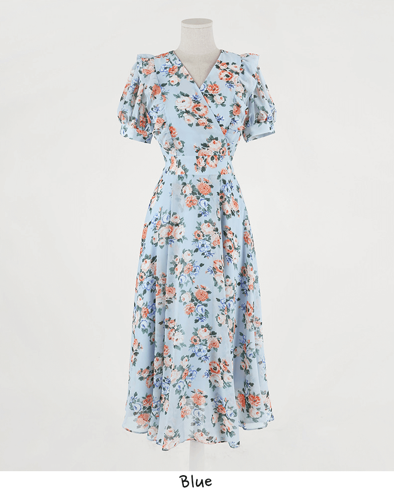 Romantic floral chiffon dress in blue with short puff sleeves and V-neckline, perfect for spring fashion.