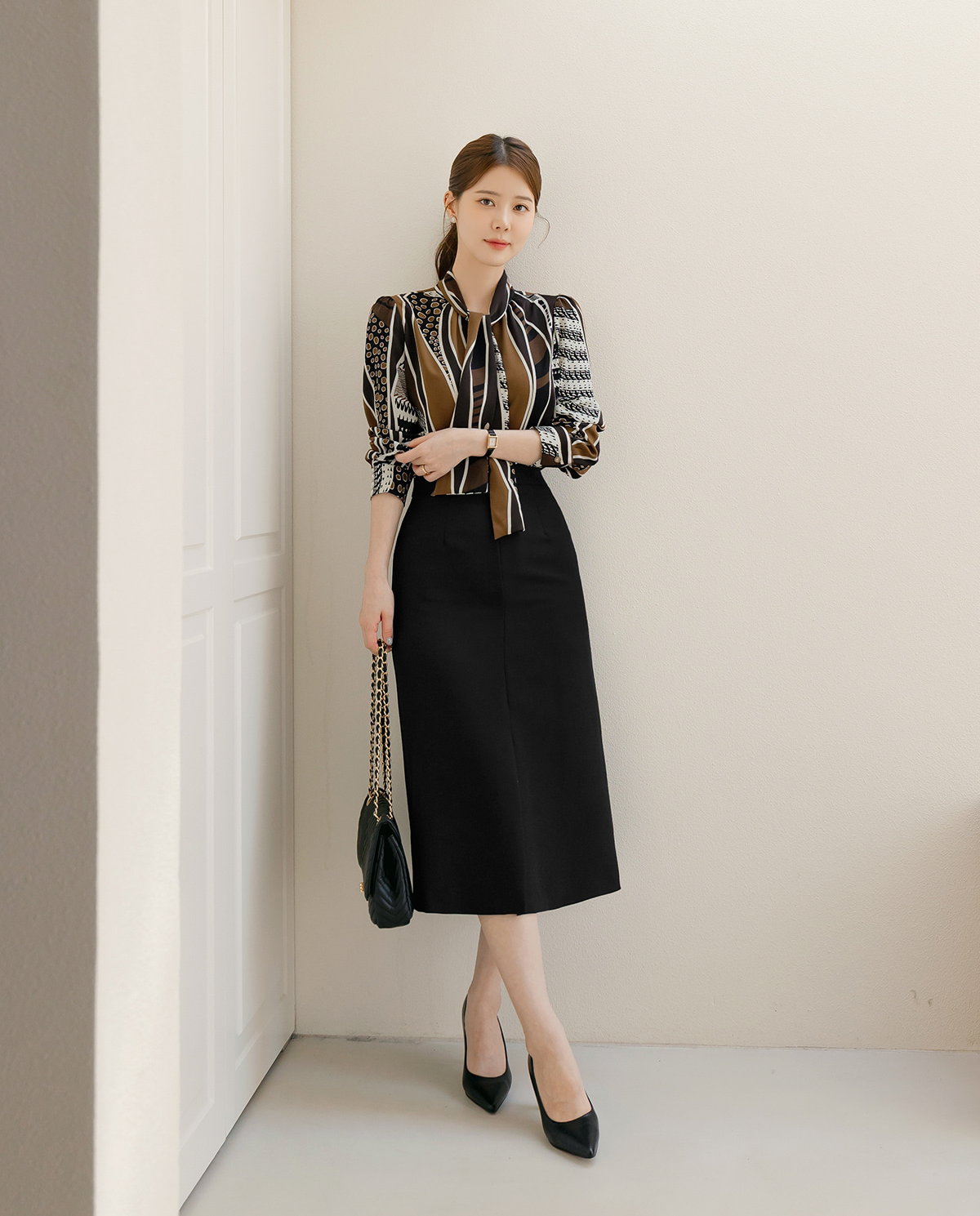 Refined Tie-Neck Blouse with an Artistic Print