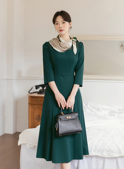 Elegant 3/4 Sleeve Belted Dress with Sheer Neckline Accent