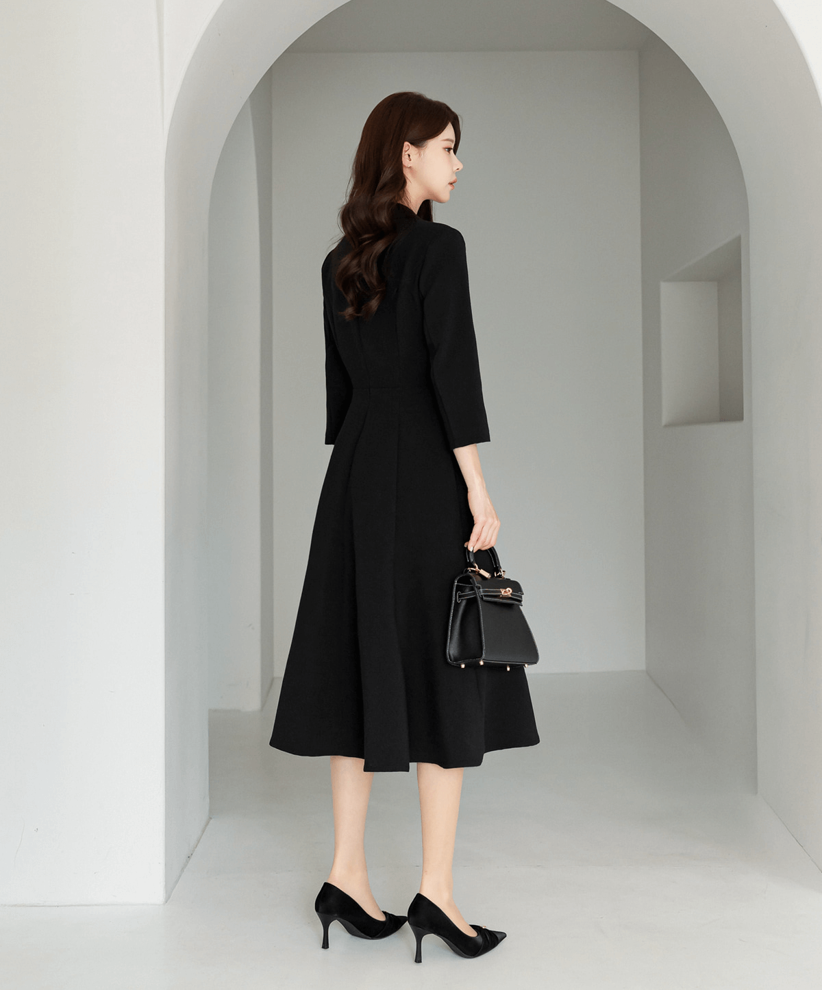 Classic black flare dress with collar and double-breasted buttons