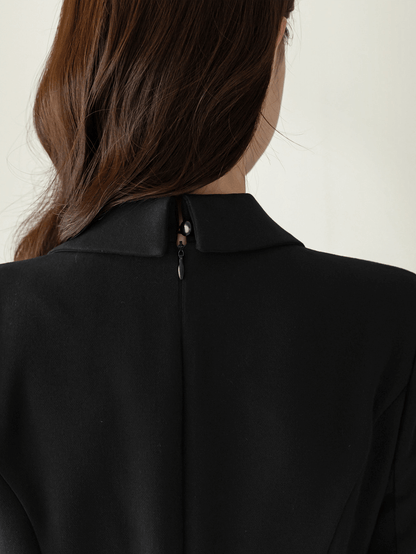 Classic black flare dress with collar and double-breasted buttons