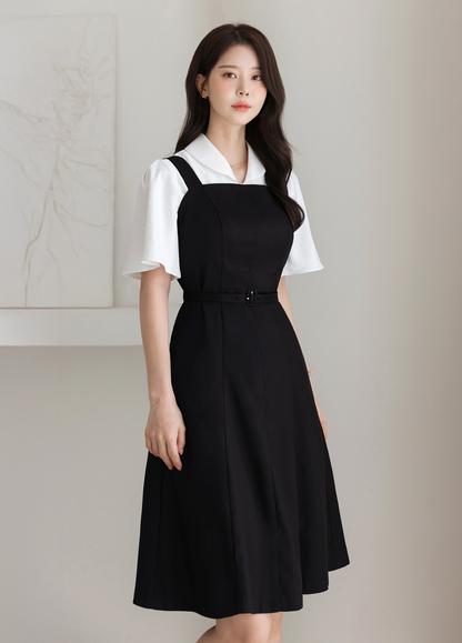 Modern Sleeveless Black Dress with Waist Belt and Side Pockets