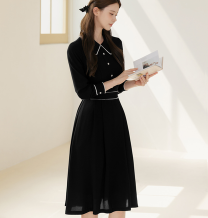 Black Flare Dress with Lace-Trimmed Collar and Enamel Button Detail