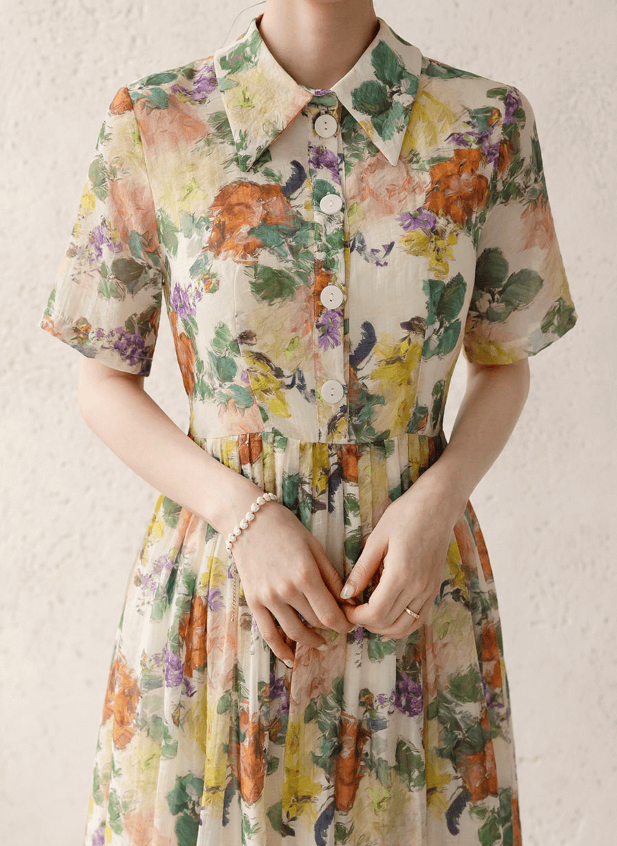 Romantic floral dress with pintuck detail and collar neckline, soft flare silhouette, delicate floral print, elegant fashion.