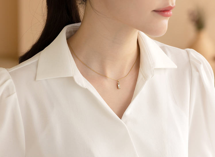 Elegant Wrap Peplum Blouse with a Flattering Waistline