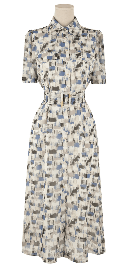 Breezy chiffon shirt dress with belt, abstract blue pattern, short sleeves, and collared neckline - perfect for effortless summer style.