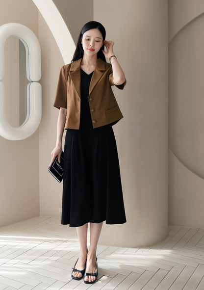 Elegant Sleeveless Black Flare Dress with V-Neck and Wide Shoulder Line