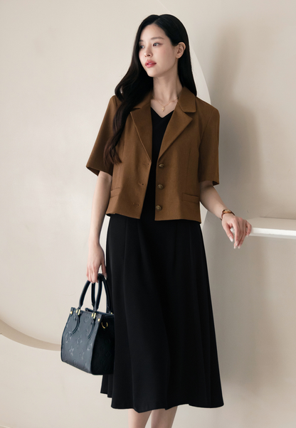 Elegant Sleeveless Black Flare Dress with V-Neck and Wide Shoulder Line