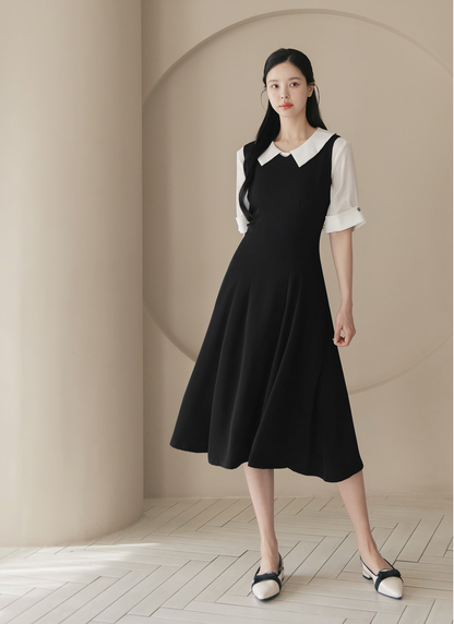 Elegant Sleeveless Black Flare Dress with V-Neck and Wide Shoulder Line