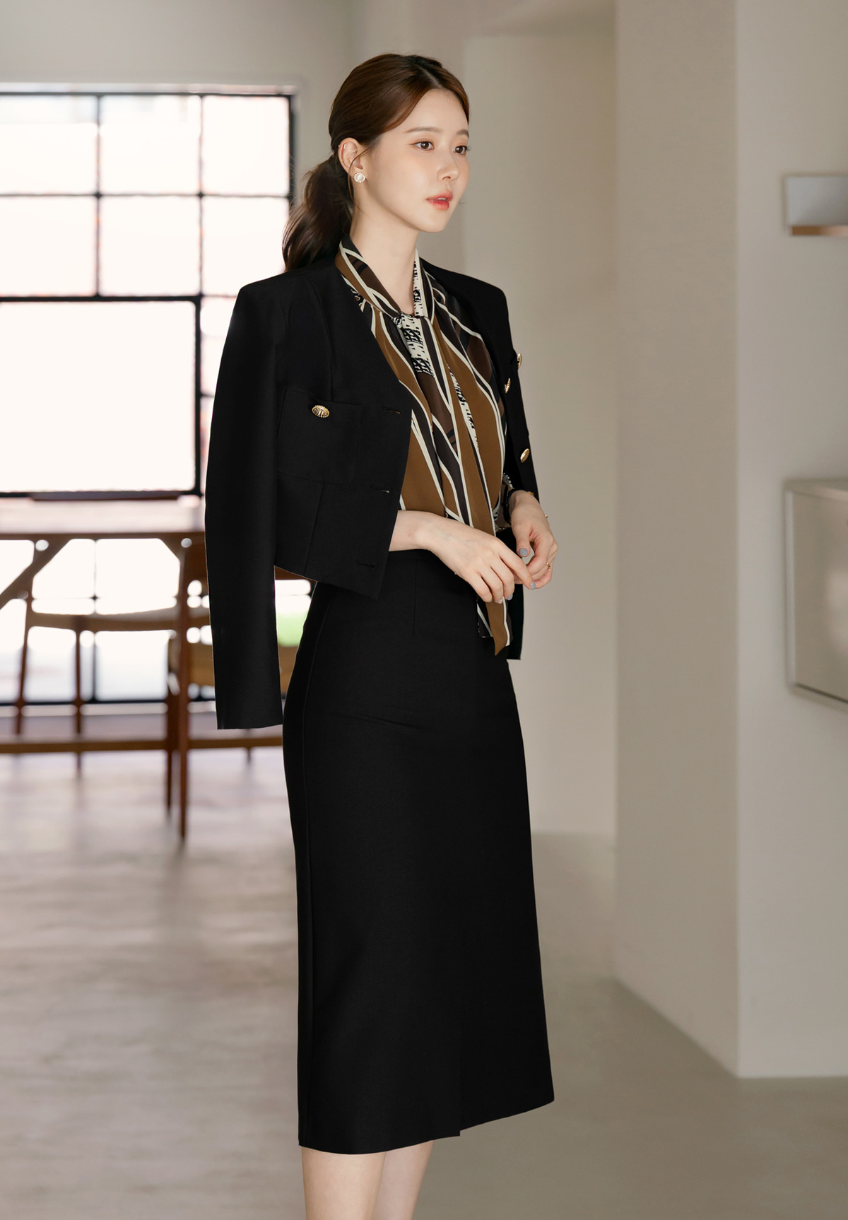 Refined Tie-Neck Blouse with an Artistic Print